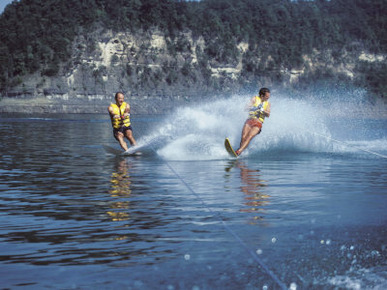 Two Young Men Water Skiing