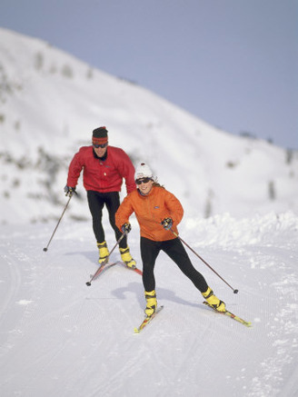 Colorful Couple Cross Country Skiing