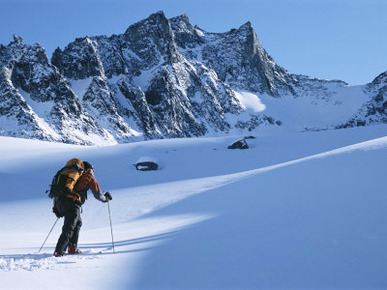 A Man Skiing in the Selkirk Mountains, British Columbia, Canada