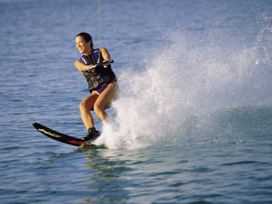 Young Woman Waterskiing