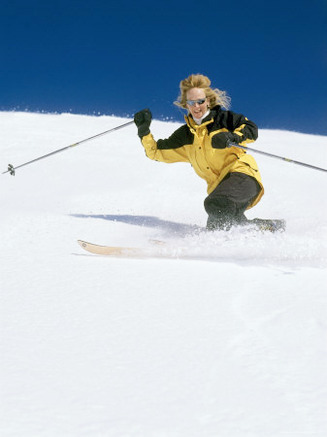 Woman in Yellow and Black Skiing