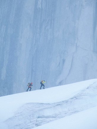 Two People Skiing on a Glacier During a Snowstorm, Denali National Park, Alaska