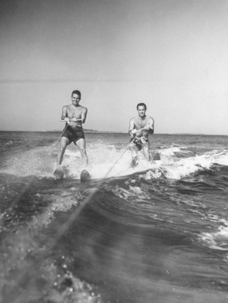 Two Men Behind Boat Which Is Not Seen, Water Skiing