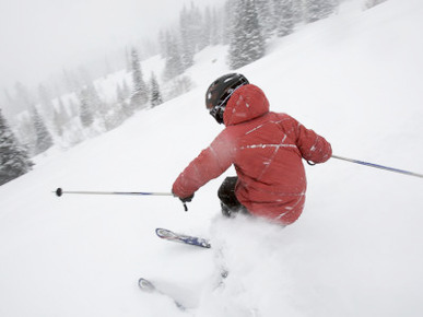 Eight-Year-Old Boy Skiing on a Fresh Powder Day