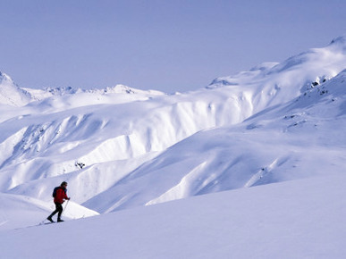 Woman Skiing in Scenic Haines Pass, Alaska